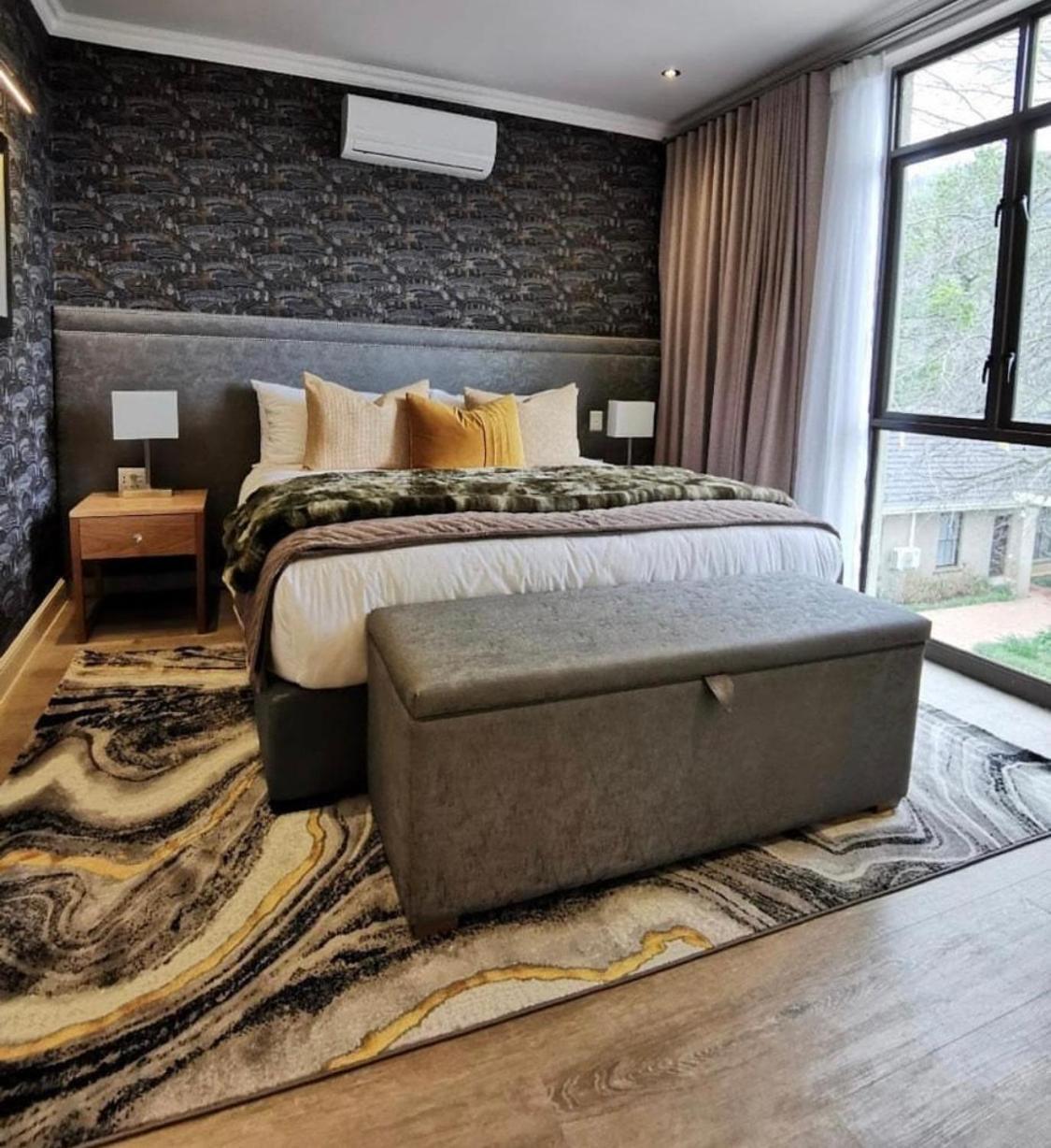 Alluvia Boutique Winery & Luxury Accommodation Stellenbosch Cameră foto A bedroom with a storage bench